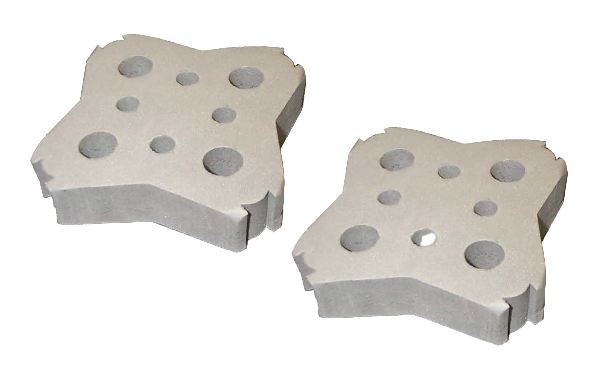 Two metallic cutting tools with a star-shaped design on a white background