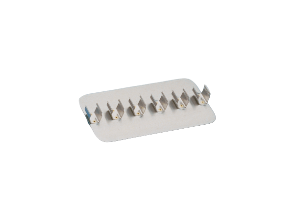 Metallic tool holder with multiple slots on a white background
