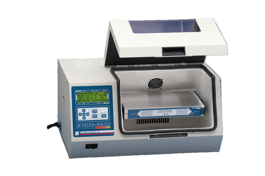 Lab incubator with digital display on a blue background